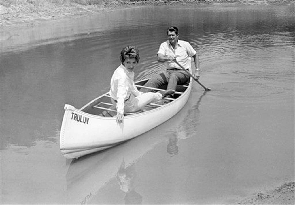 Ronald Reagan took his wife Nancy for a canoe ride on a pond at their mountain ranch near Santa Barbara, Calif., on July 27, 1976. Reagan announced in Los Angeles that he had selected liberal Republican U.S. Senator Richard S. Schweiker as his vice presidential running mate if nominated at the GOP National Convention in Kansas City in August. (AP Photo/Walter Zebowski)